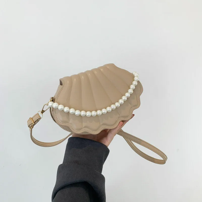 Women's simple messenger bag in PU shell shape with single shoulder strap, available in multiple colours