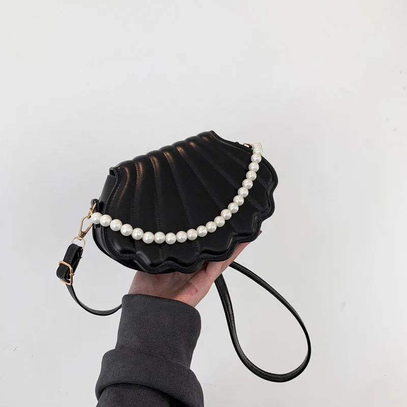 Women's simple messenger bag in PU shell shape with single shoulder strap, available in multiple colours