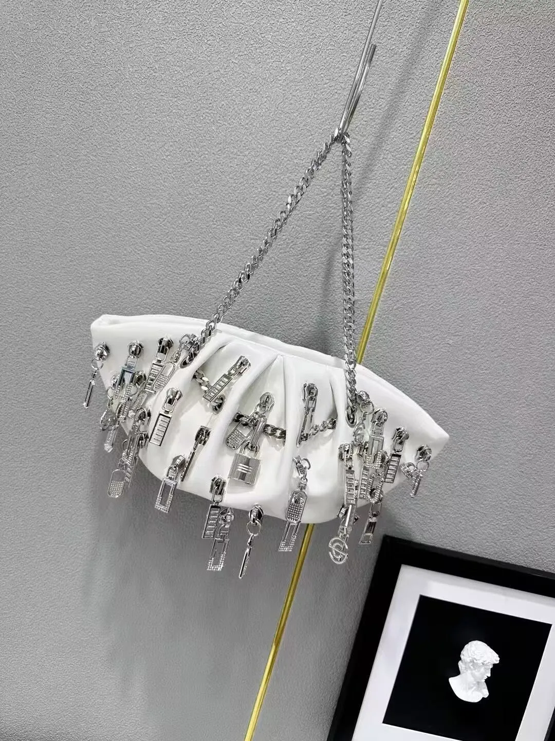 Niche chain cloud shoulder crossbody metal handbag in PU with dumbbell shape, chain and lock details, street trend style