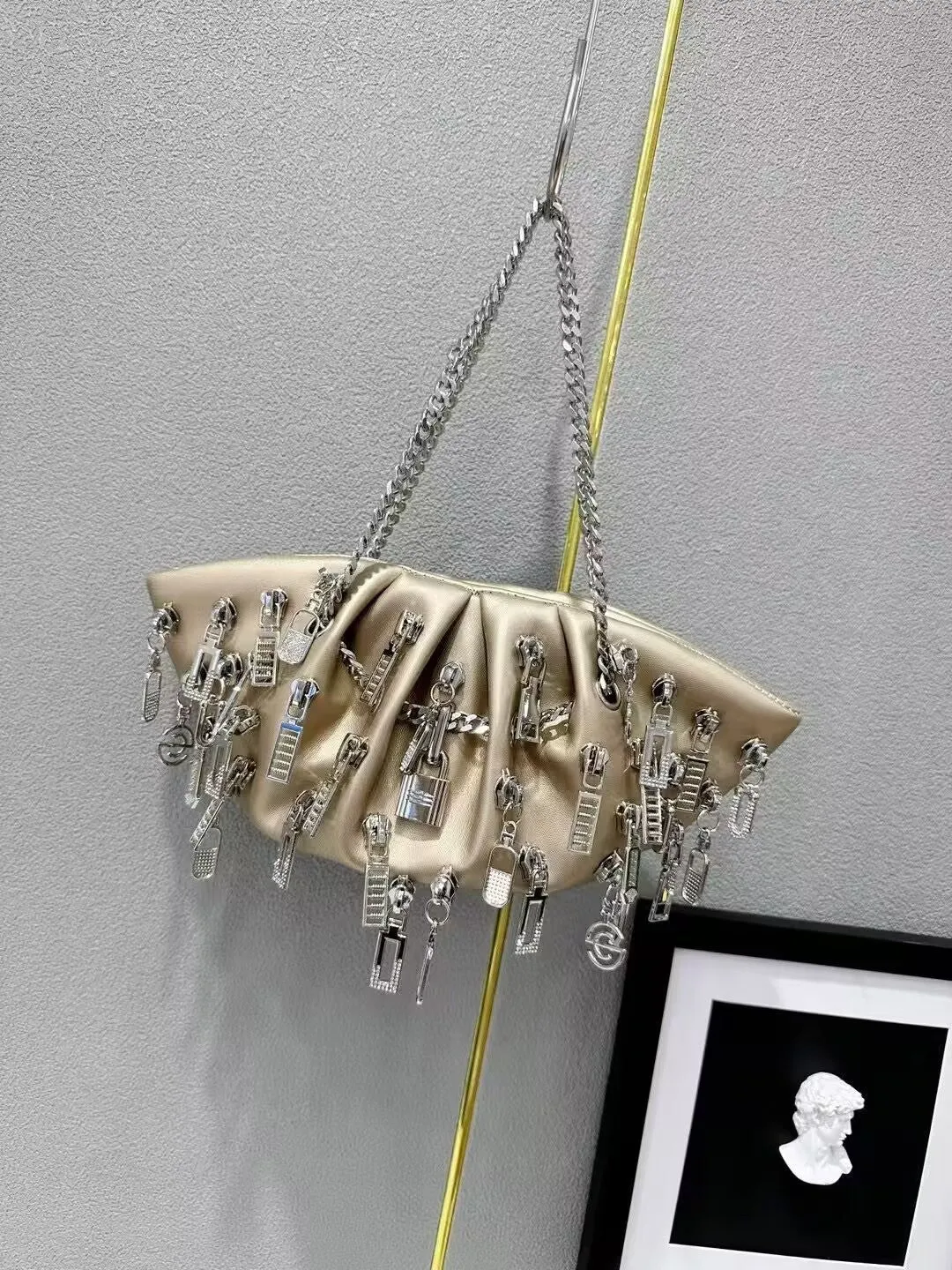 Niche chain cloud shoulder crossbody metal handbag in PU with dumbbell shape, chain and lock details, street trend style
