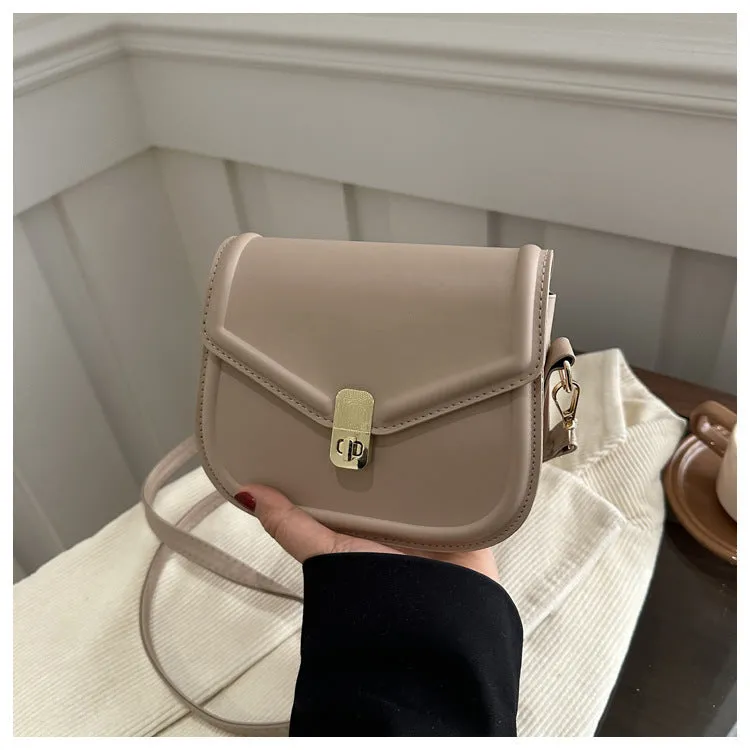 Soft PU leather messenger bag with clamshell opening in horizontal square shape