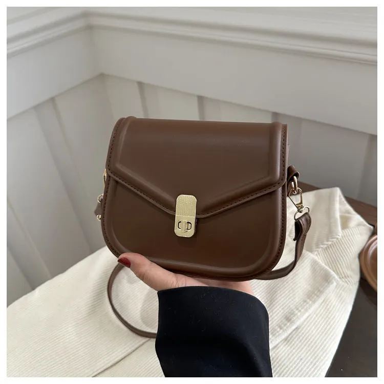 Soft PU leather messenger bag with clamshell opening in horizontal square shape