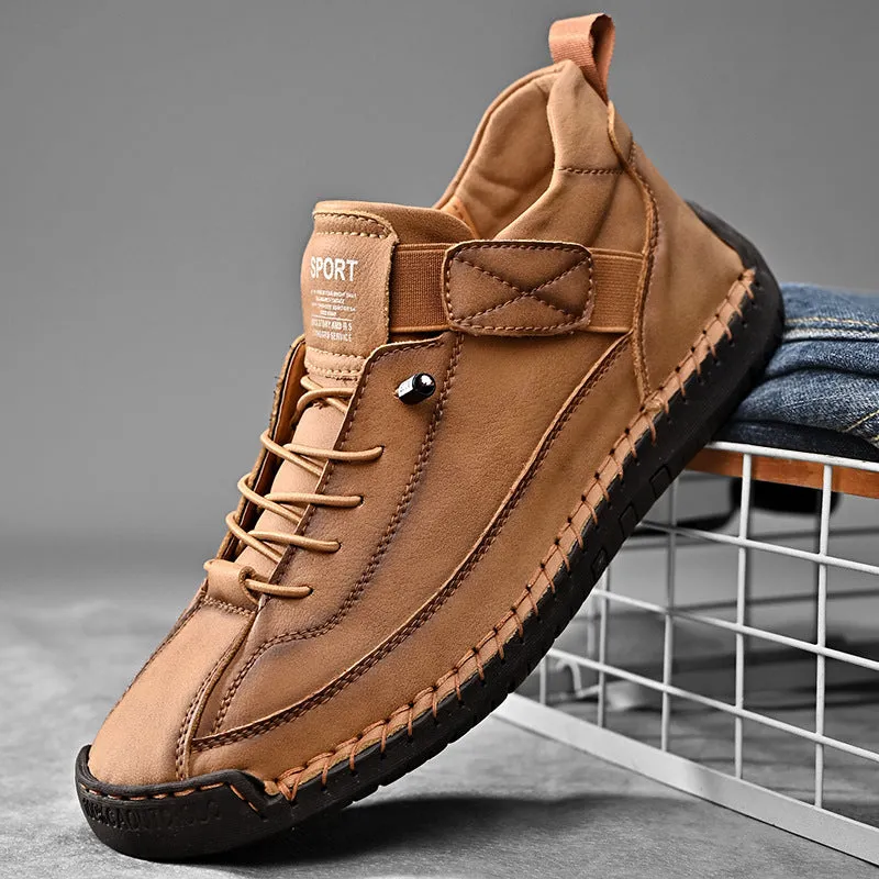 Men's mid-calf Martin boots in khaki with visible tooling stitching and an elastic band across the instep.