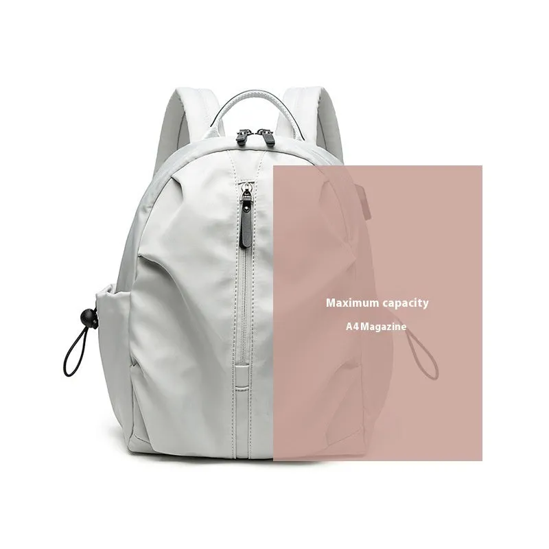 Women's Korean-style simple business travel backpack in dirty pink, Oxford cloth, with computer pocket, small A4 size