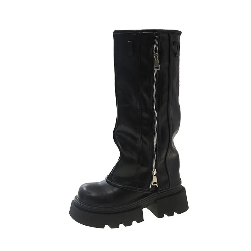 Black platform muffin pants Martin boots with a high cylinder, square heel, and rubber sole.