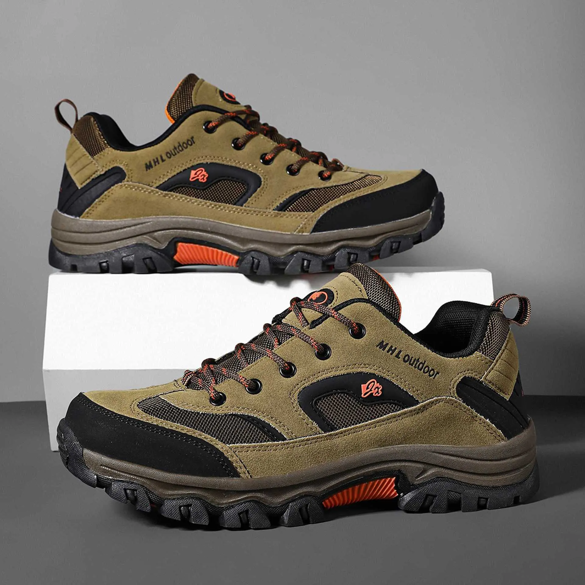 Men's waterproof non-slip mountain climbing sneakers soft bottom in army green on rocky trail