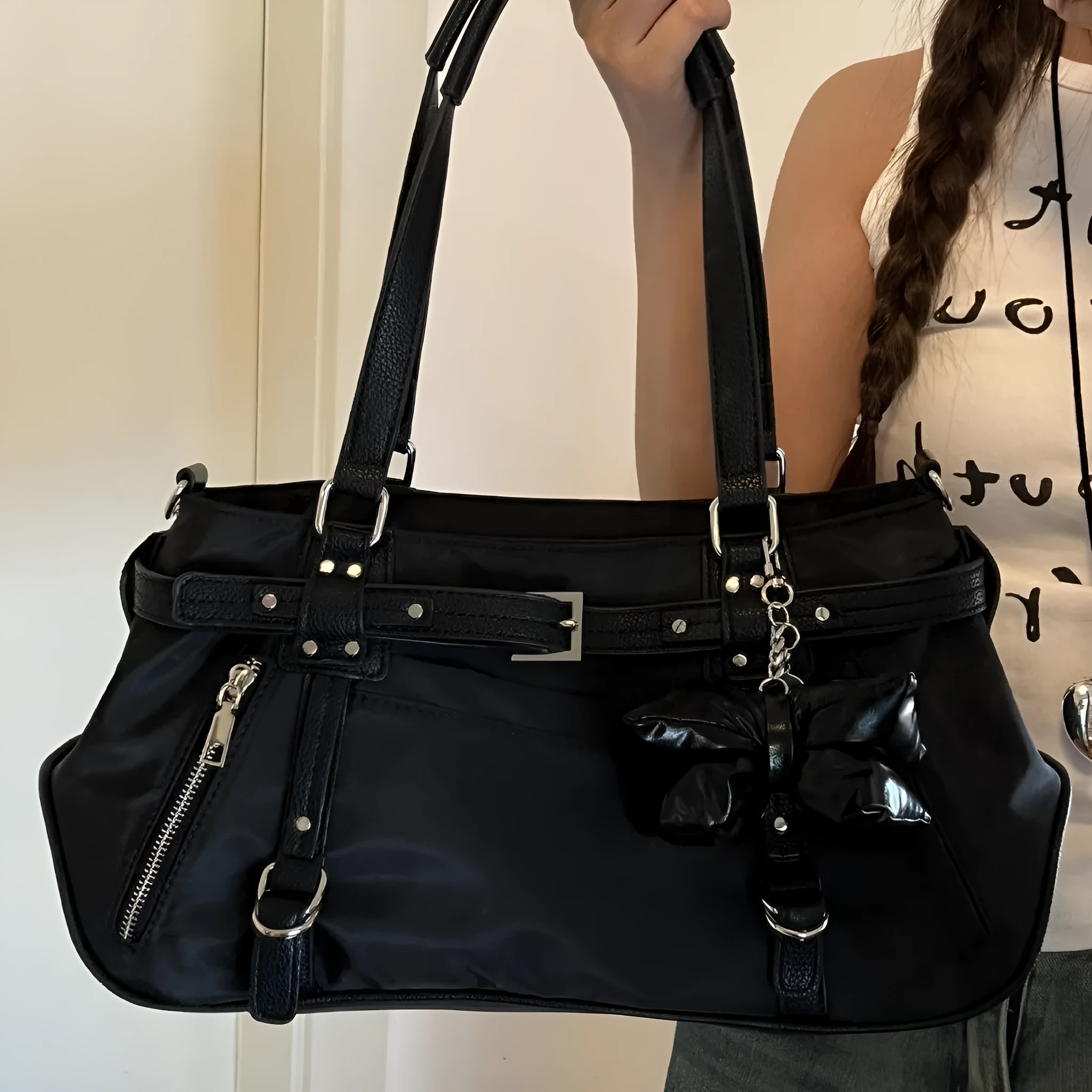 Soft PU motorcycle satchel with headwind texture, underarm design, horizontal square shape in black colour