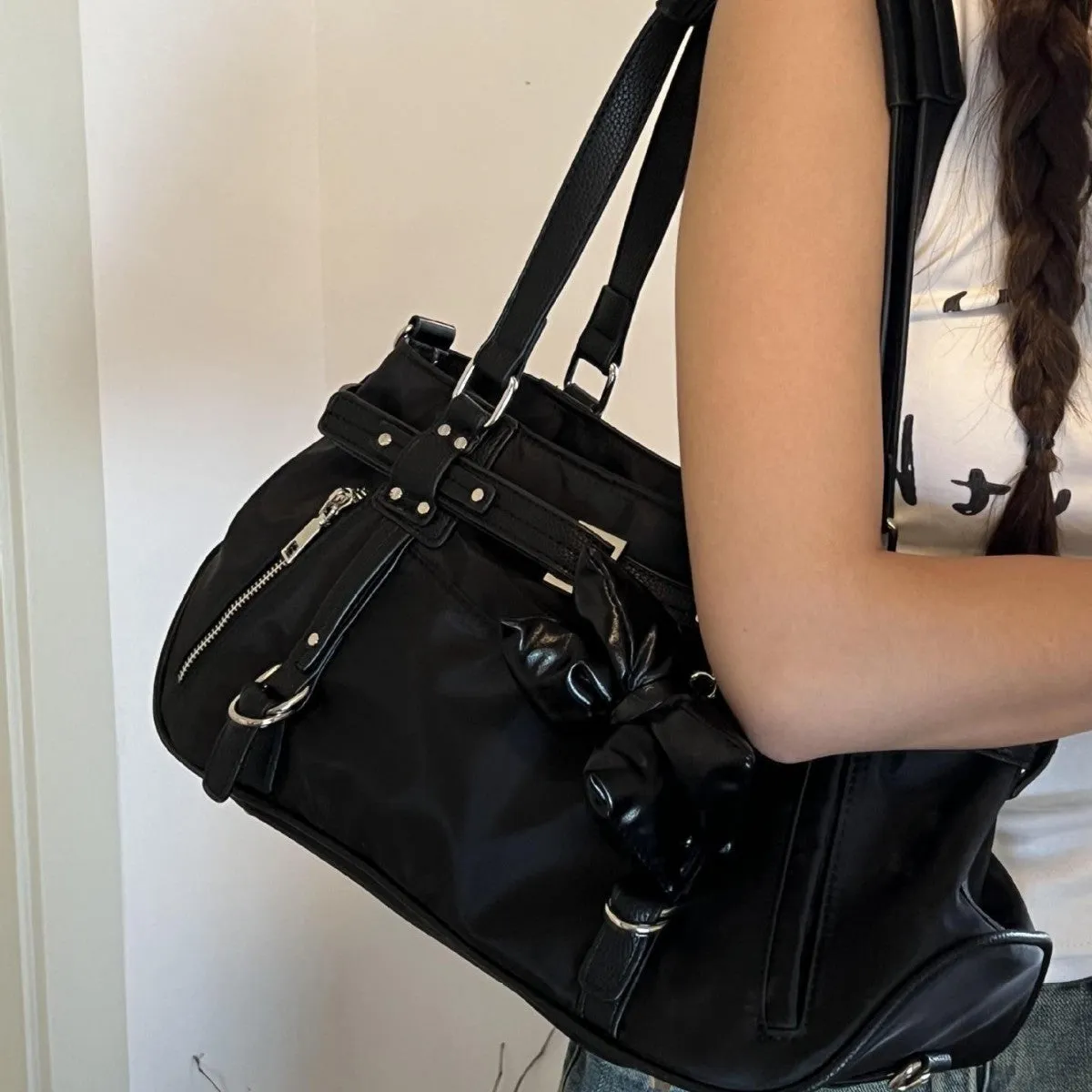 Soft PU motorcycle satchel with headwind texture, underarm design, horizontal square shape in black colour