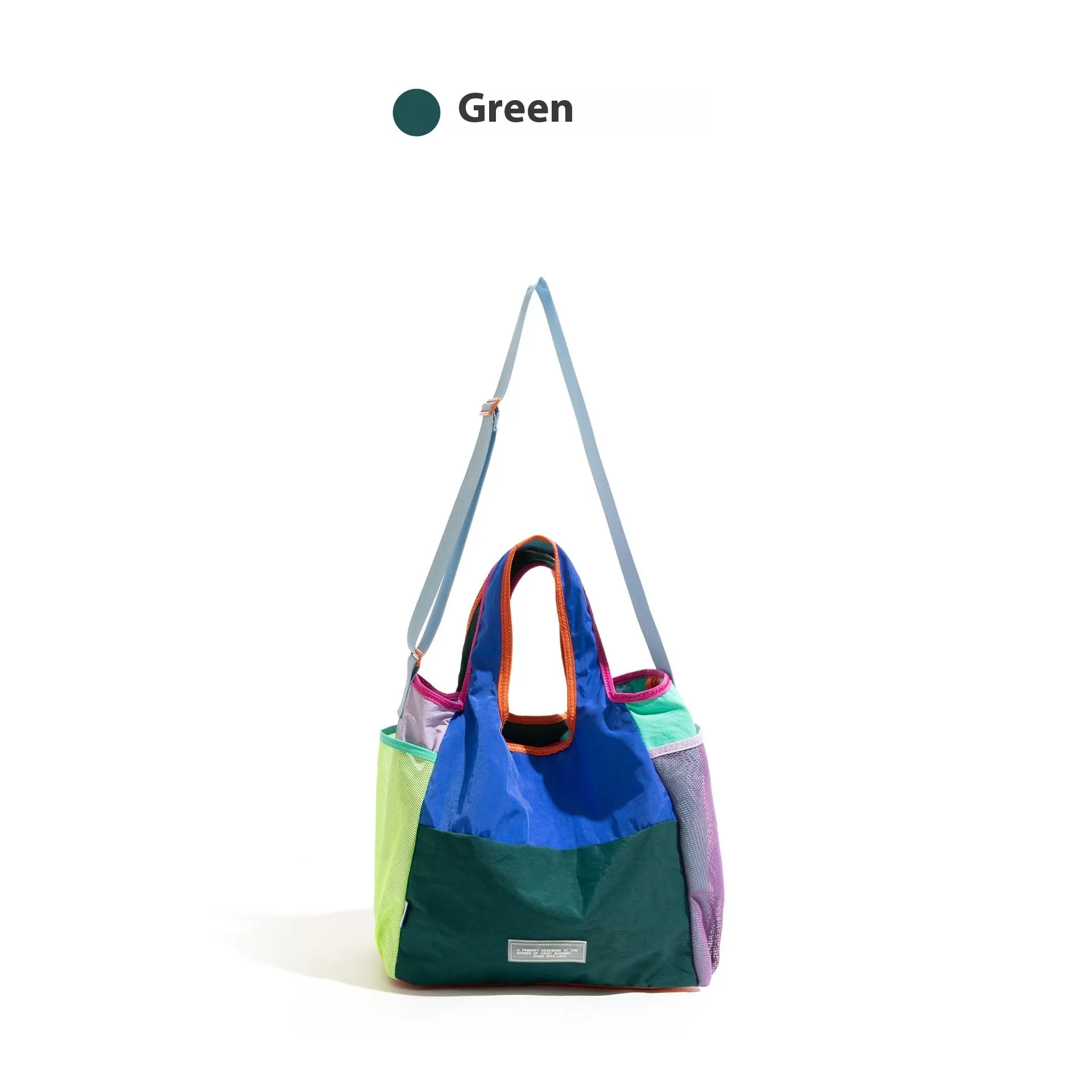 Foldable canvas tote bag in orange with crossbody strap, polyester material