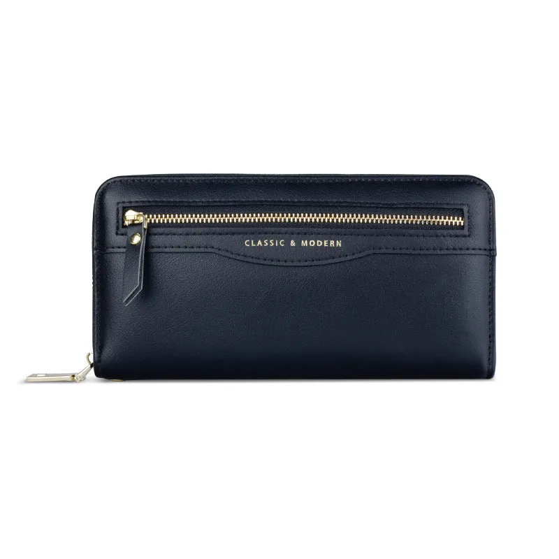 Women's long clutch wallet in PU leather with zipper closure, available in multiple colours