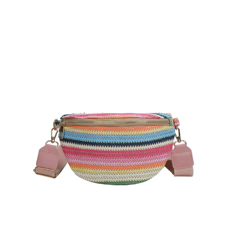 Blue Bohemian style straw beach bag with single shoulder strap and shell shape