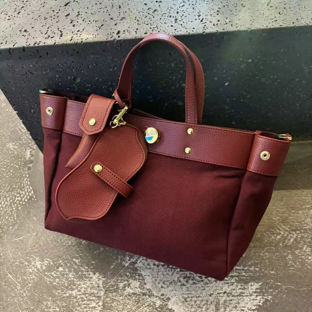 Genuine leather high canvas crossbody bag with soft cowhide texture in wine red colour