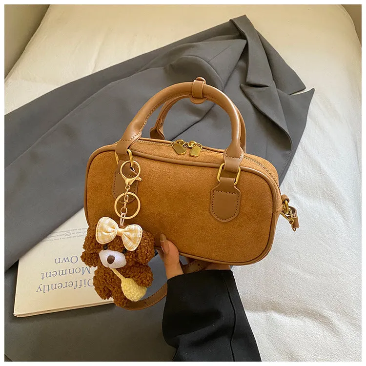 American retro PU leather bowling bag in brown with pendant and crossbody strap