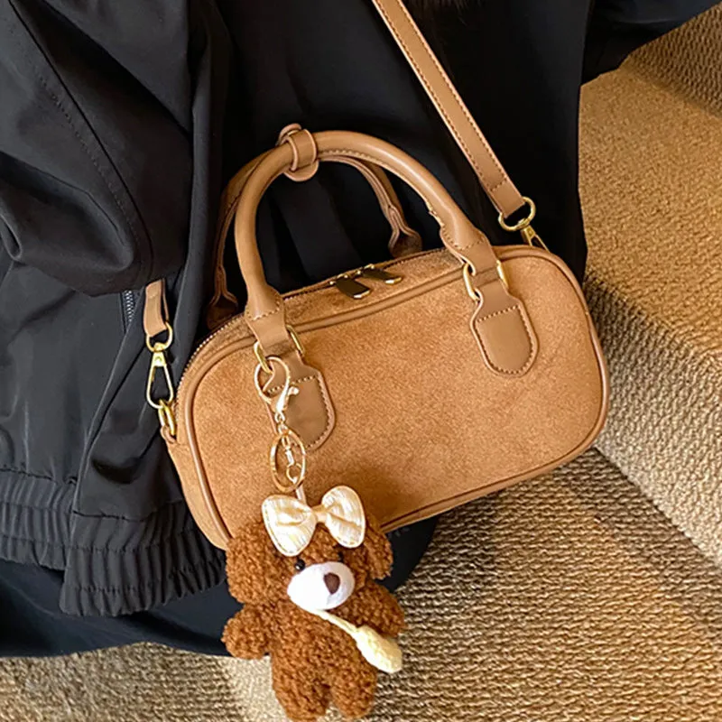 American retro PU leather bowling bag in brown with pendant and crossbody strap