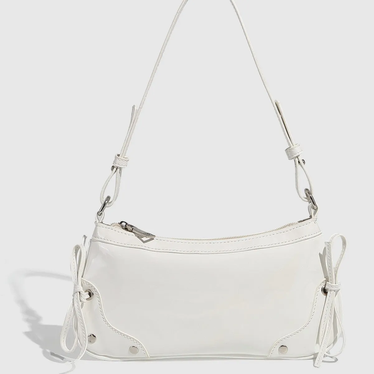 Solid colour PU underarm bag with double bow and rivet decoration, horizontal square shape