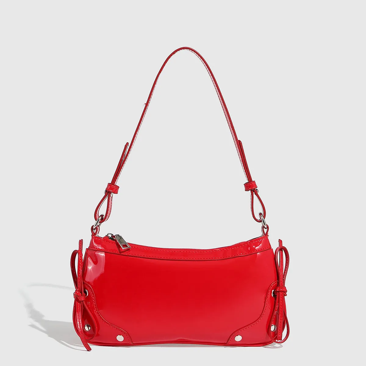 Solid colour PU underarm bag with double bow and rivet decoration, horizontal square shape