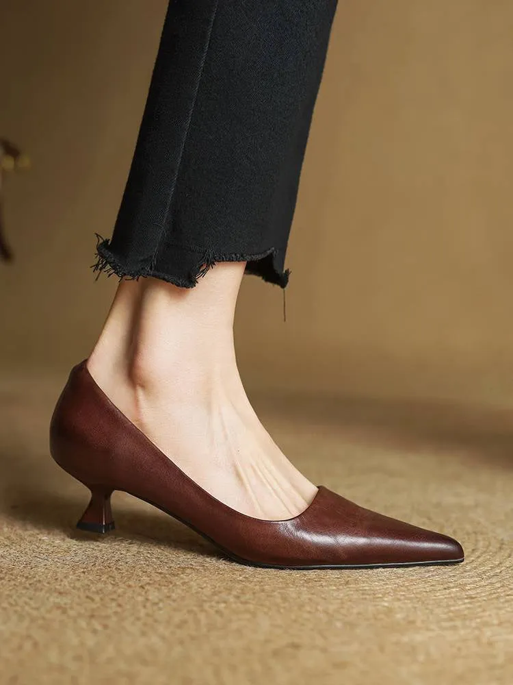 Pointed toe shallow mouth work shoes in brown with waxed pigskin leather upper and mid heel