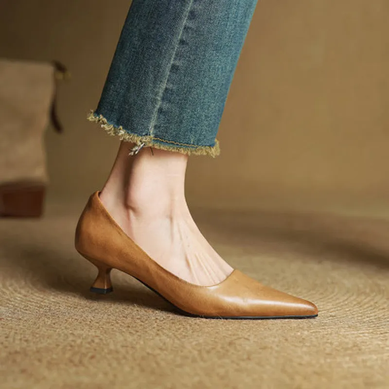 Pointed toe shallow mouth work shoes in brown with waxed pigskin leather upper and mid heel