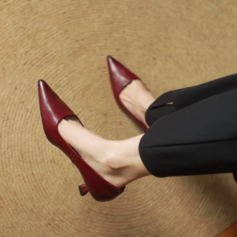 Pointed toe shallow mouth work shoes in brown with waxed pigskin leather upper and mid heel