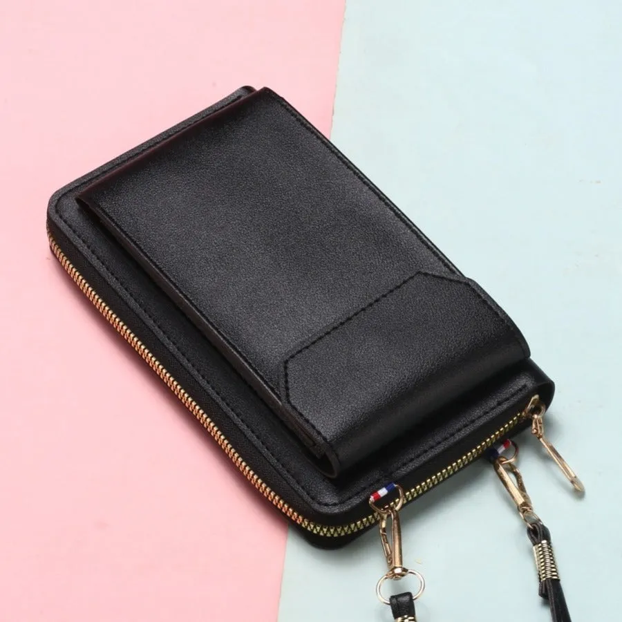 Mini crossbody phone bag for women in black PU leather with adjustable strap and sewing thread detail.