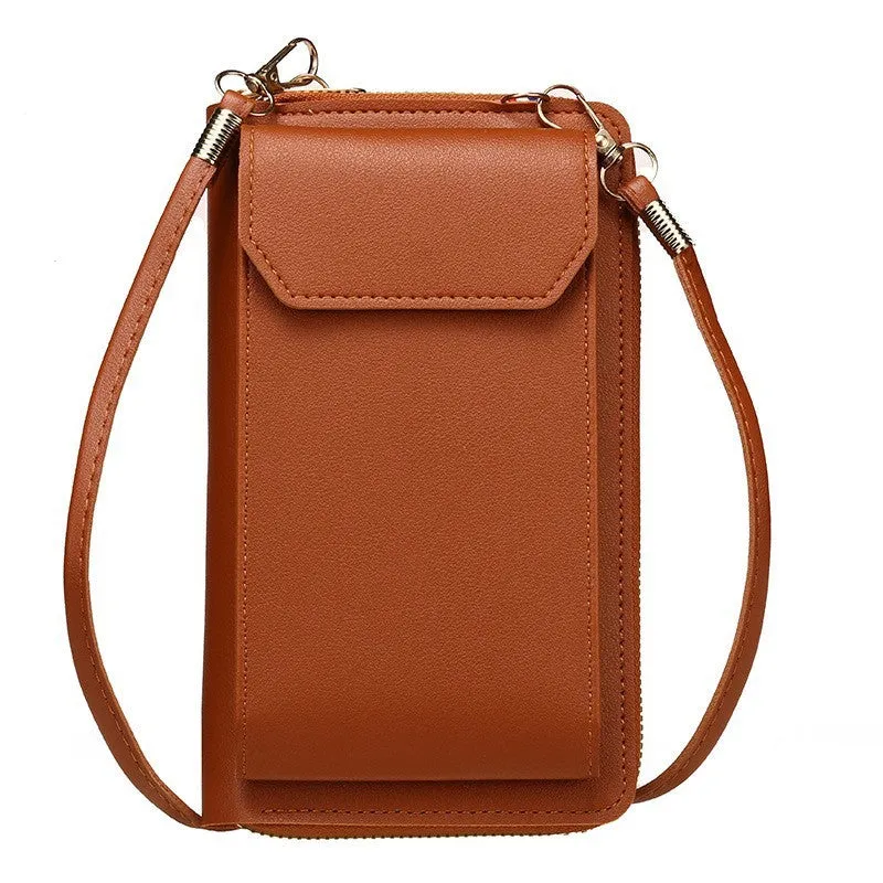 Mini crossbody phone bag for women in black PU leather with adjustable strap and sewing thread detail.