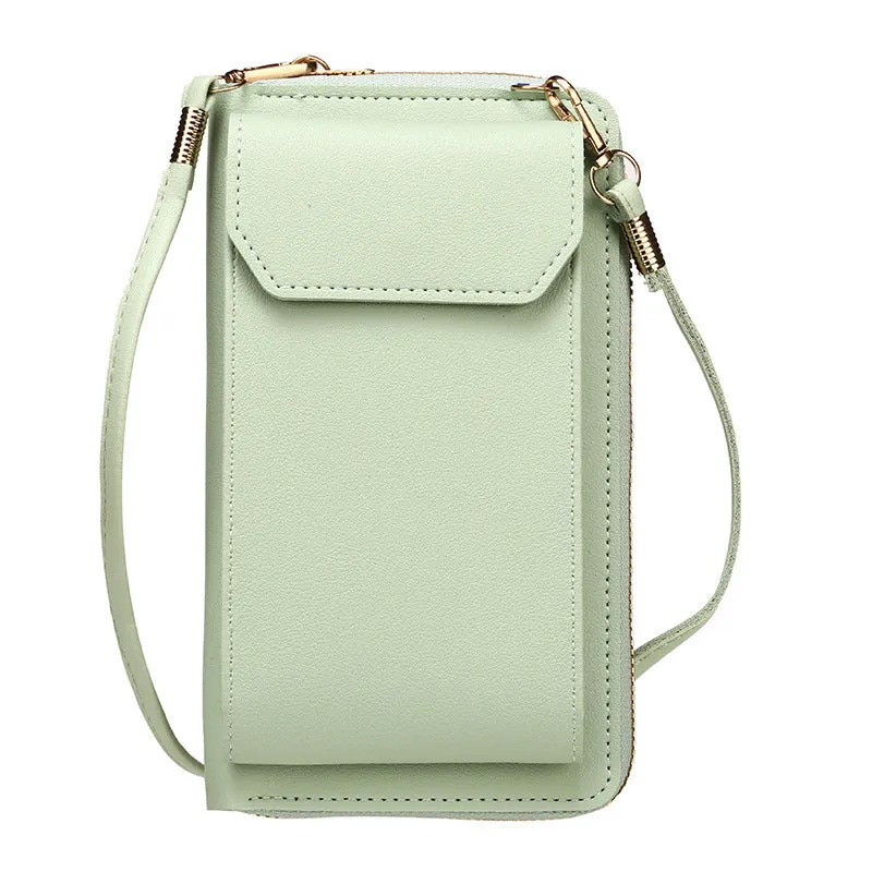 Mini crossbody phone bag for women in black PU leather with adjustable strap and sewing thread detail.