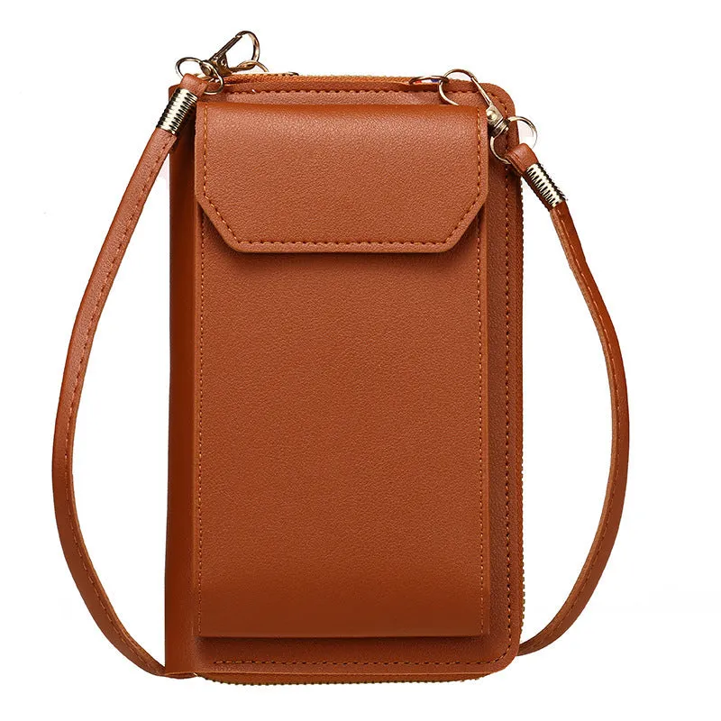 Mini crossbody phone bag for women in black PU leather with adjustable strap and sewing thread detail.