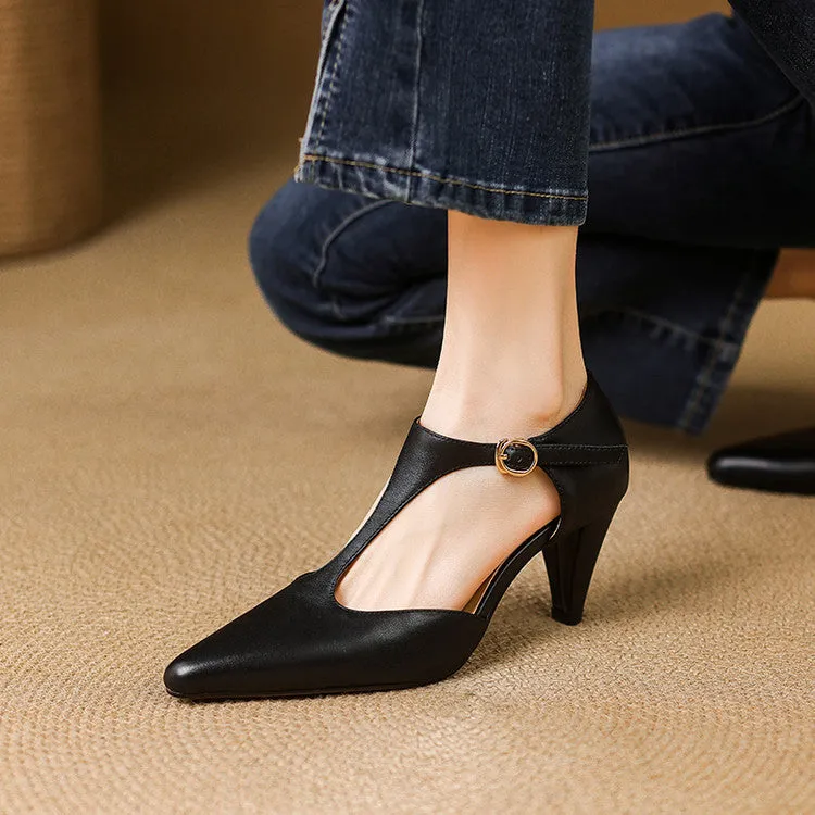 Brown retro women's T-strap sandals with a round toe, buckle closure, and a short stout heel.
