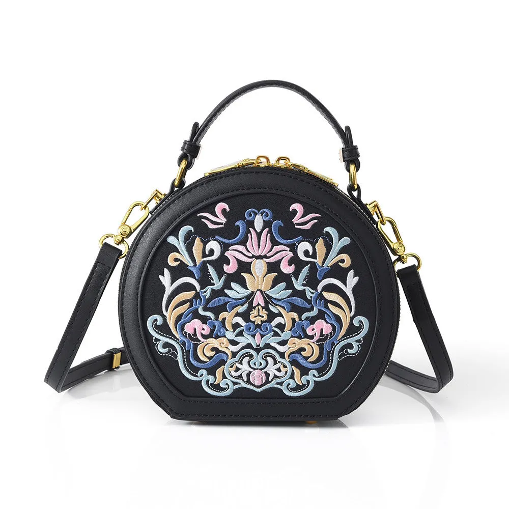 Round PU leather crossbody bag with embroidery and sewing line, available in five colours