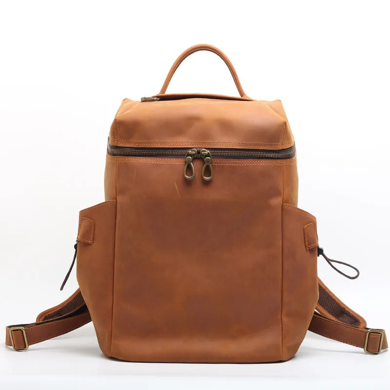 Classic retro backpack in brown Crazy Horse leather with exposed stitching and metal buckles