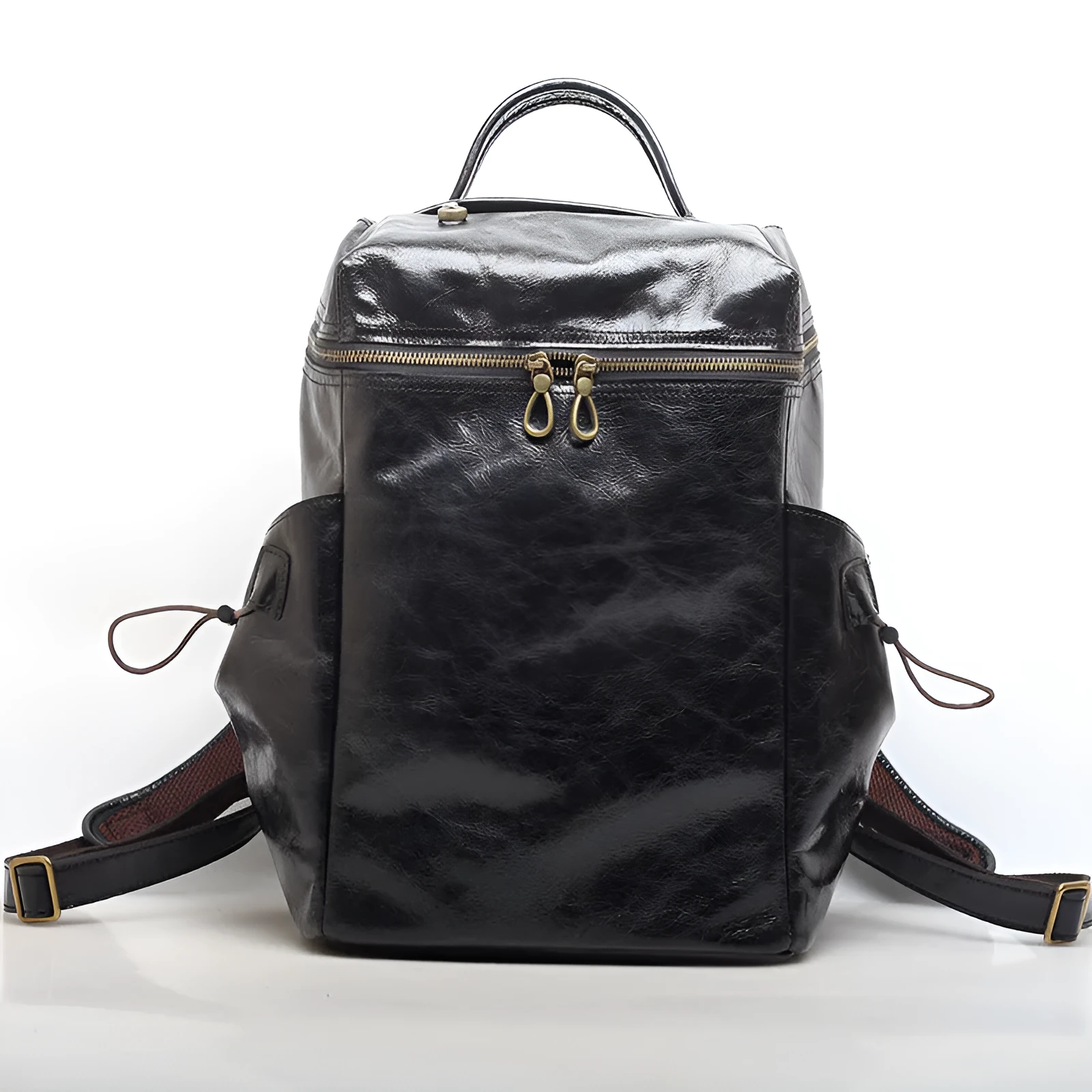 Classic retro backpack in brown Crazy Horse leather with exposed stitching and metal buckles