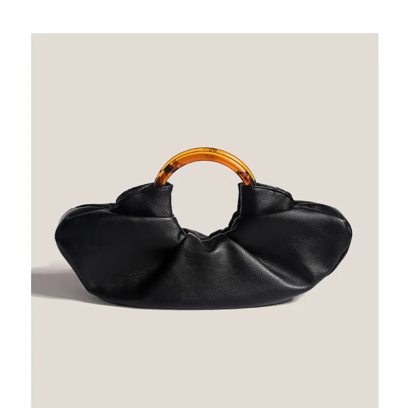 Niche Horn Bag net red acrylic ring handbag in black PU leather with fold detail