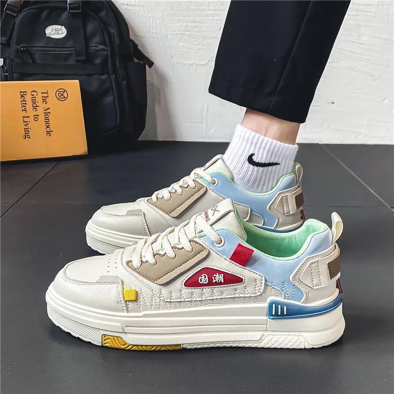 Beige black and beige red low-top white sports sneakers with round toe and lace-up closure