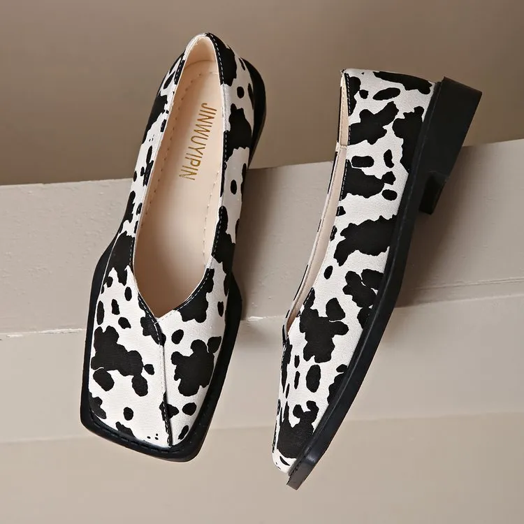 Women's cow pattern flat shoes with wedge heel in black and white, first layer cowhide upper