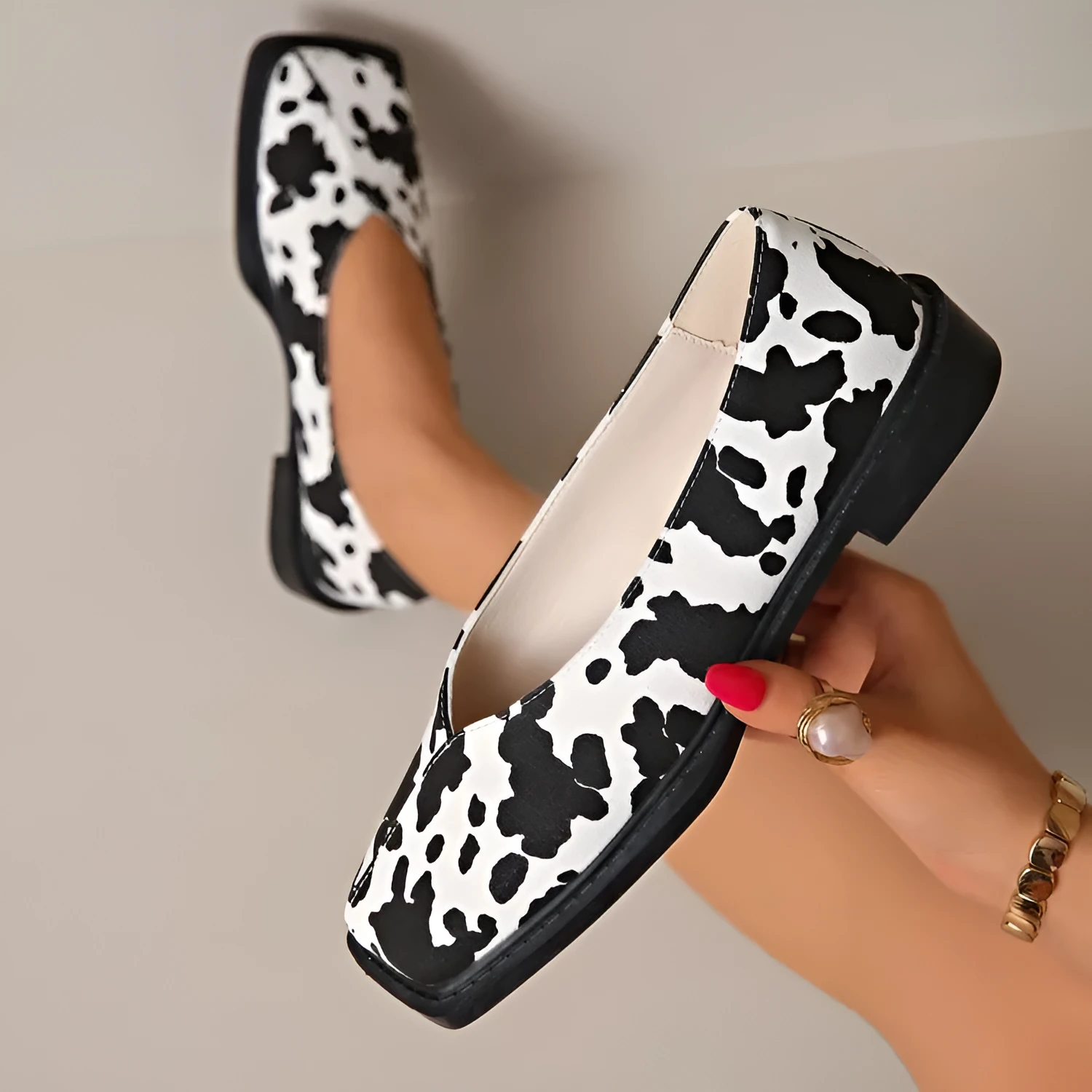 Women's cow pattern flat shoes with wedge heel in black and white, first layer cowhide upper