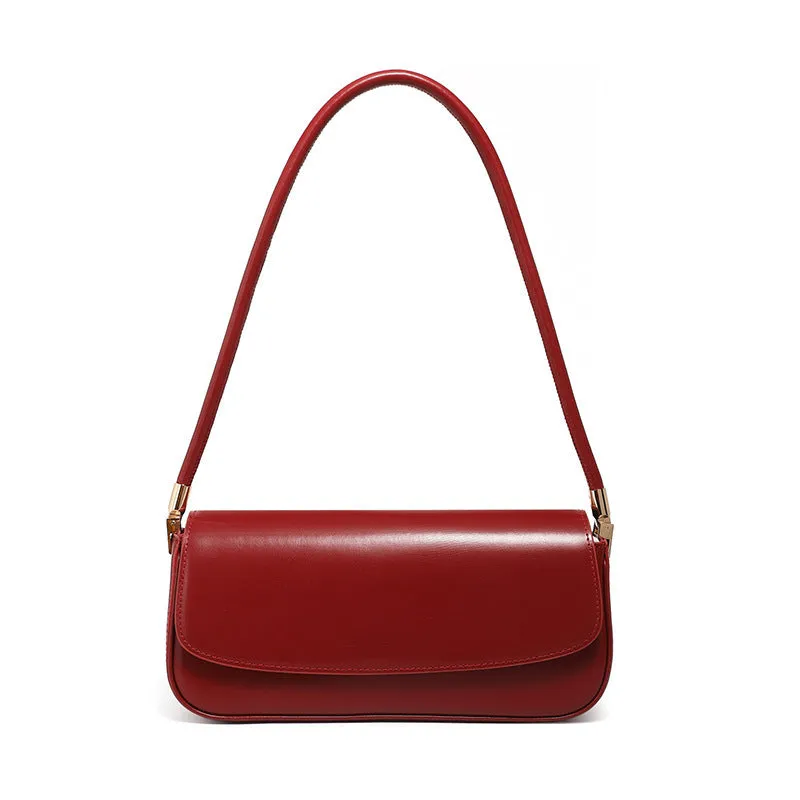 Genuine leather women's saddle bag in caramel, horizontal square shape with double straps