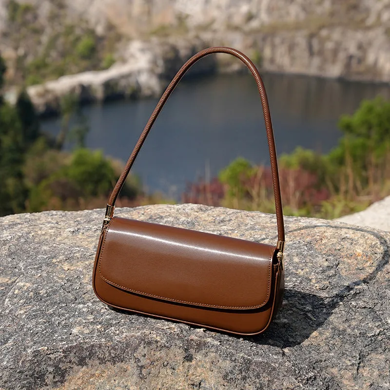 Genuine leather women's saddle bag in caramel, horizontal square shape with double straps