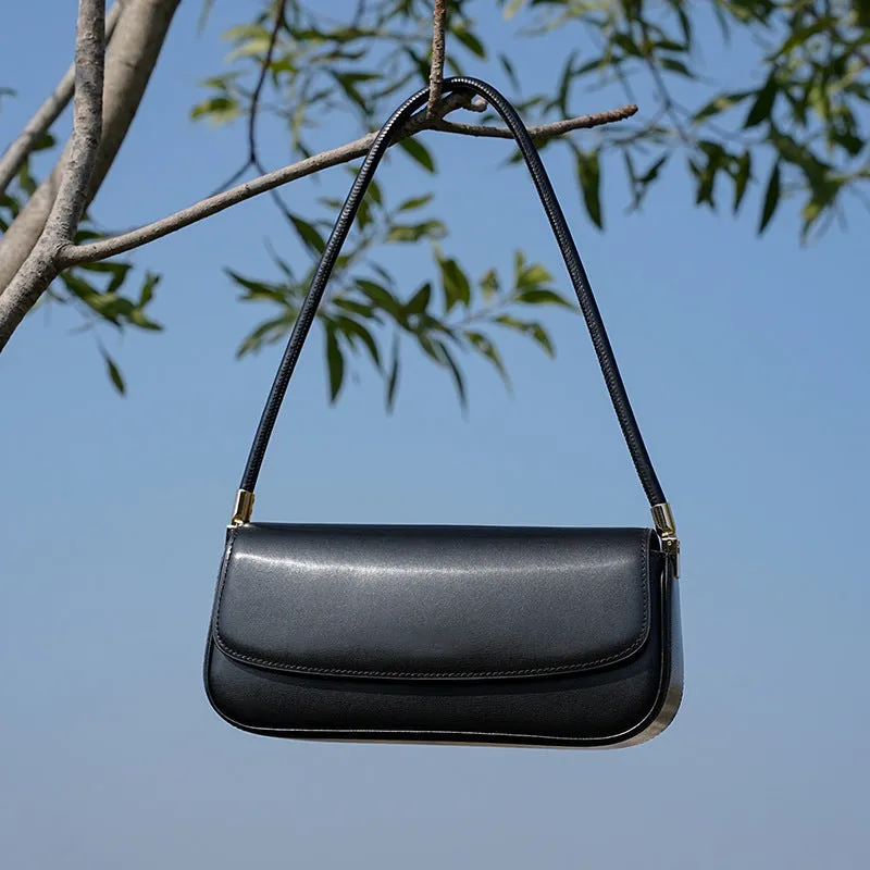 Genuine leather women's saddle bag in caramel, horizontal square shape with double straps