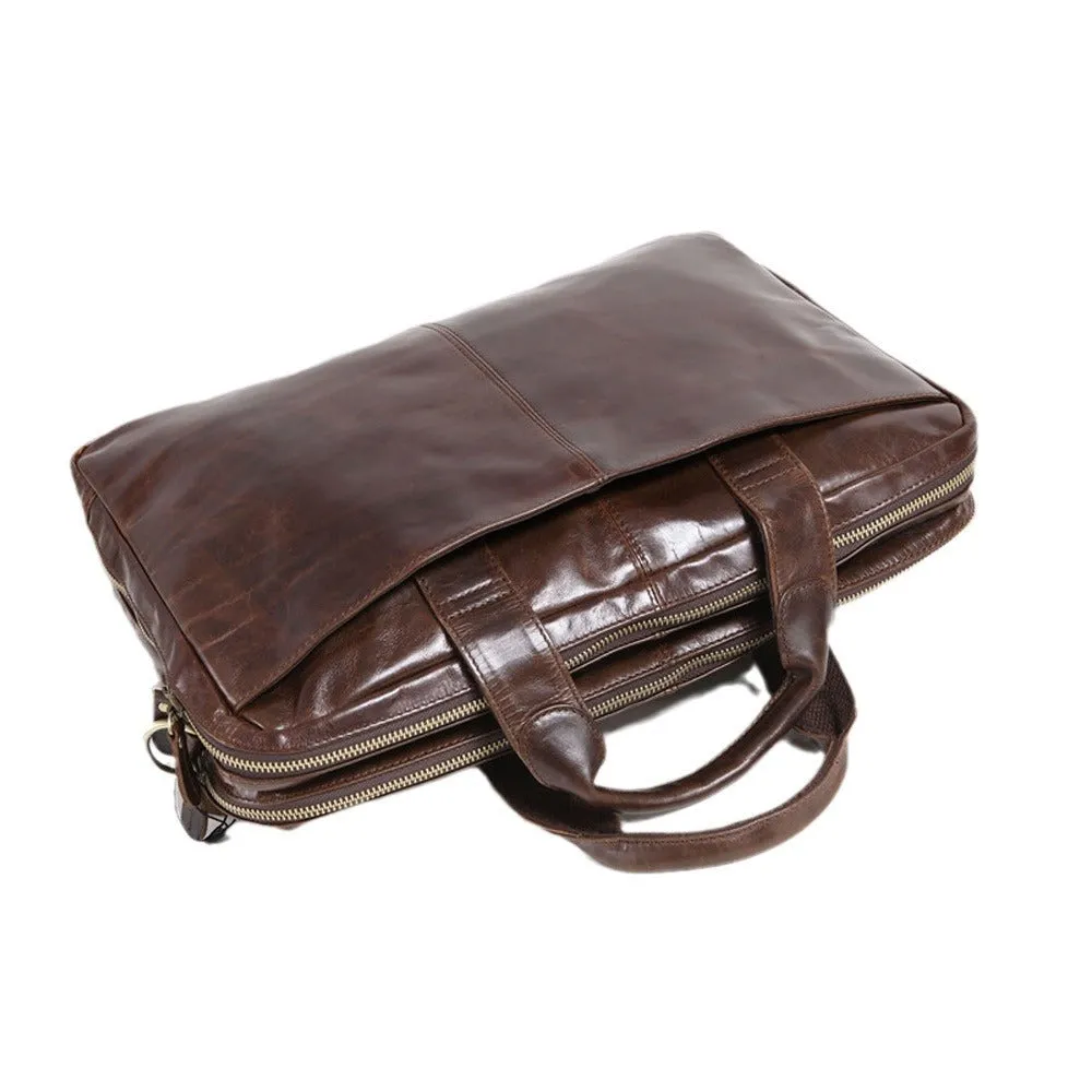 Brown men's first layer cowhide business briefcase 18 inch laptop bag on table