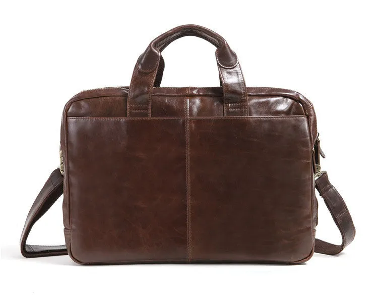 Brown men's first layer cowhide business briefcase 18 inch laptop bag on table