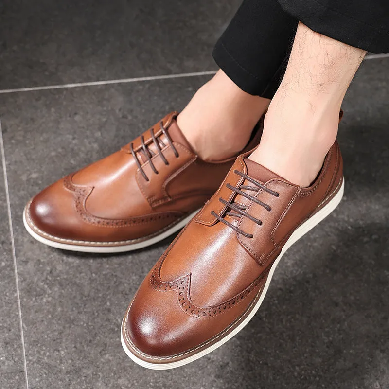 Men's slip-on business formal casual shoes in black with carved detailing and round toe