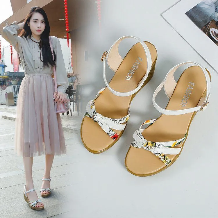 Pink women's wedge sandals with a fish mouth open toe and a thick non-slip sole.