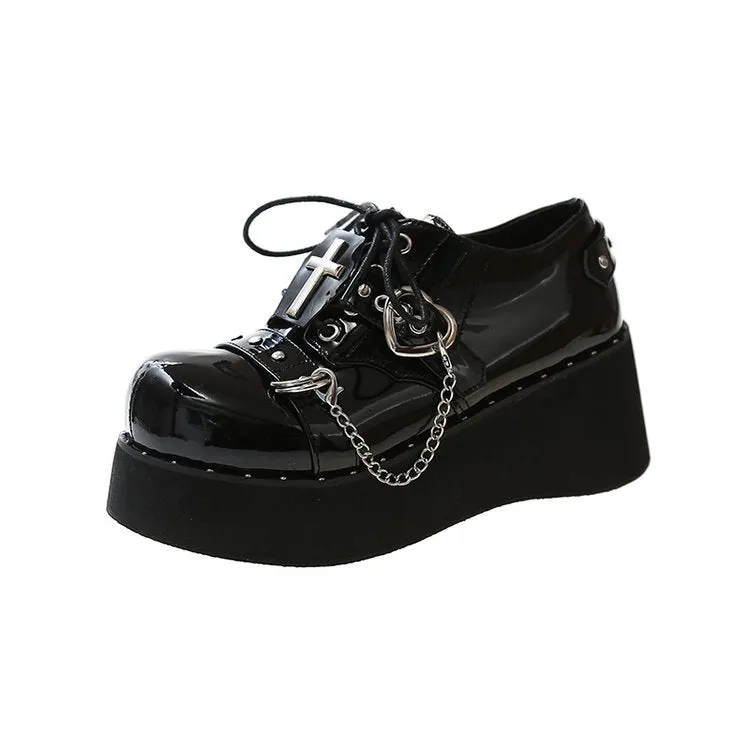 Black punk platform leather shoes with rubber sole and decorative stitching in dark lolita style