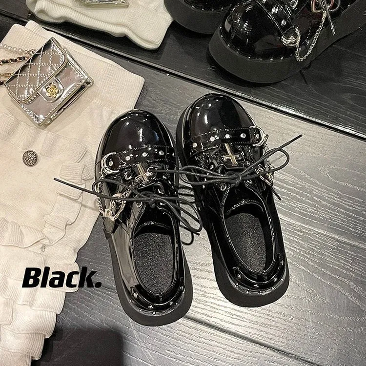 Black punk platform leather shoes with rubber sole and decorative stitching in dark lolita style