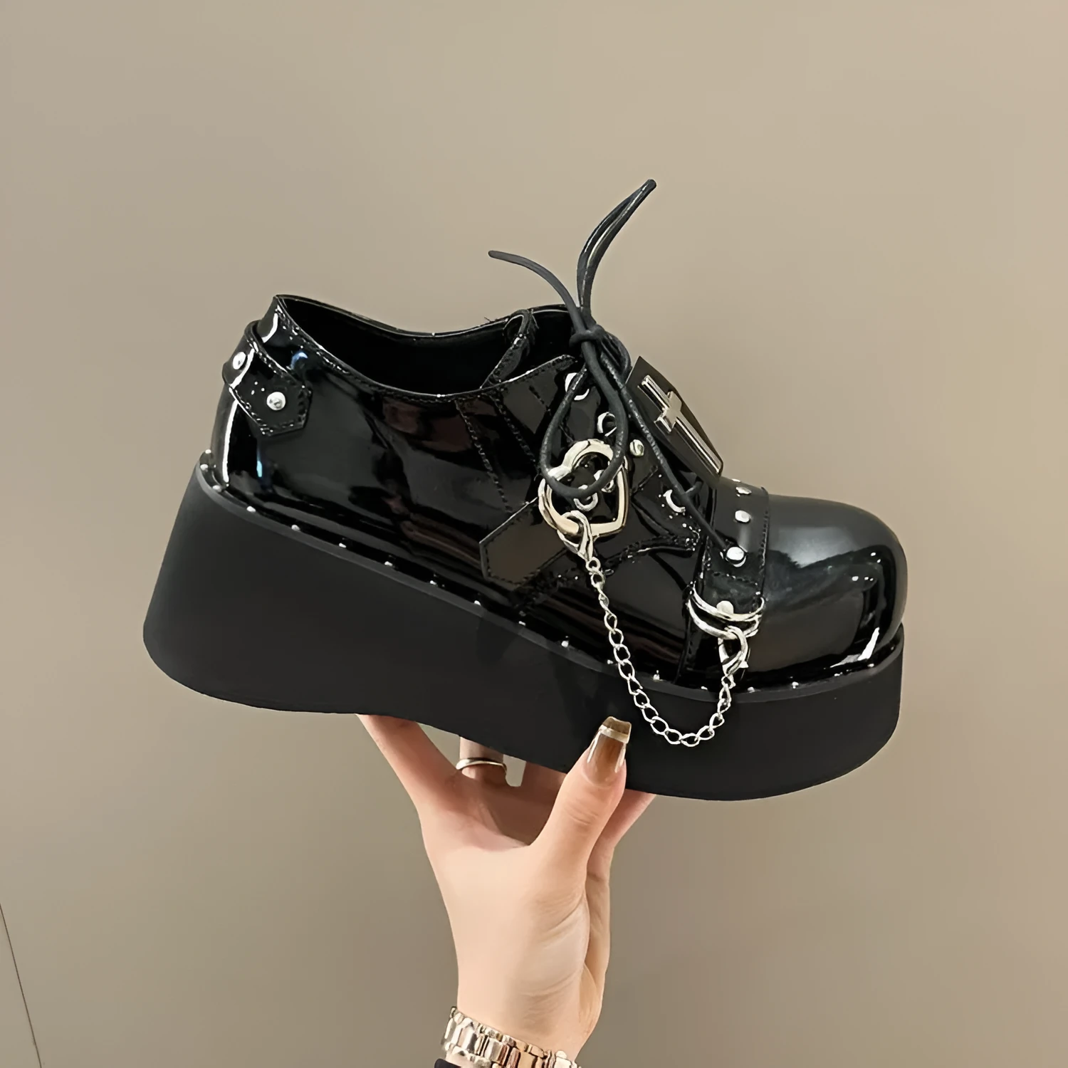 Black punk platform leather shoes with rubber sole and decorative stitching in dark lolita style