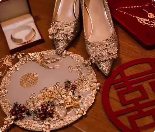 Champagne coloured bridal shoes with rhinestone crystal flower patterns and pointed toe design