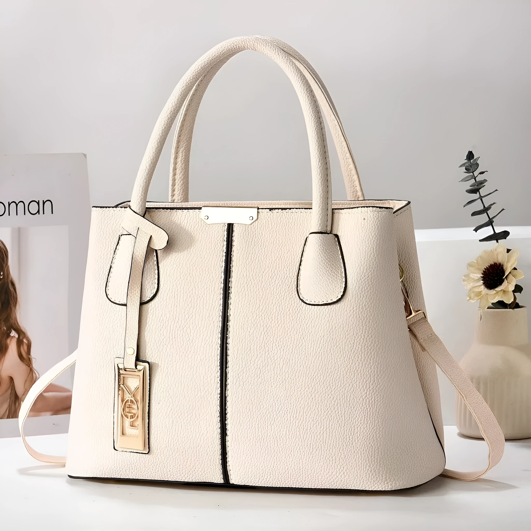 Soft PU leather large capacity shoulder bag for women in a horizontal square shape with an adjustable strap.