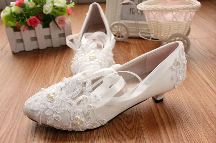 White flat wedding shoes with lace and ribbon trim, low 3cm heel, artificial PU upper