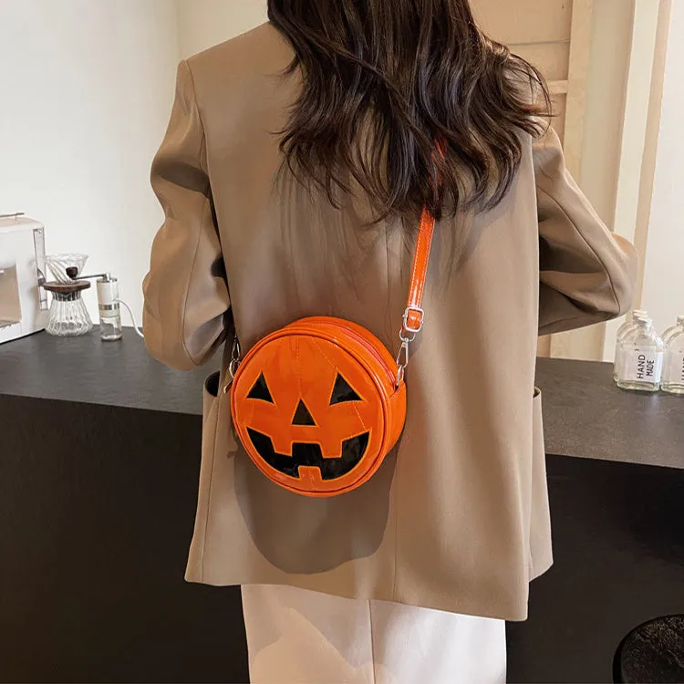 Small round pumpkin-shaped PU shoulder bag in orange for Halloween