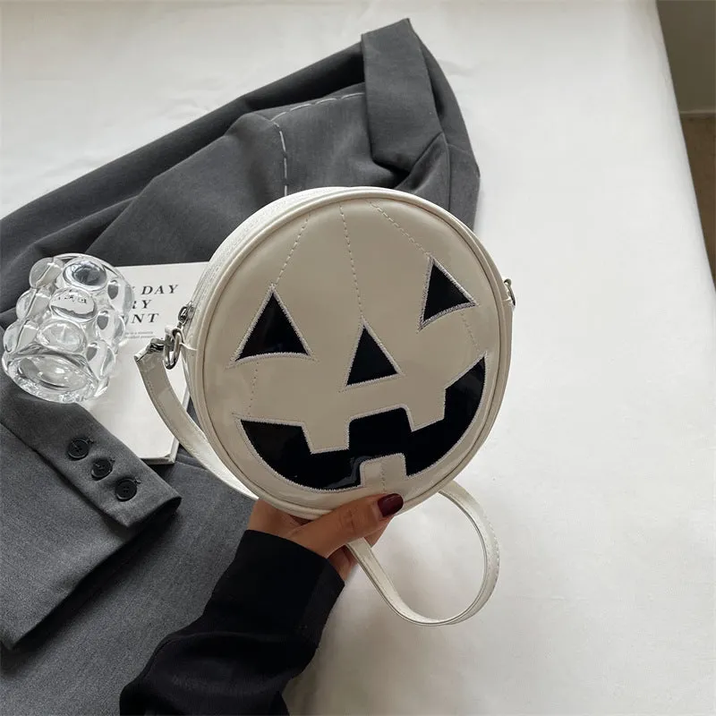 Small round pumpkin-shaped PU shoulder bag in orange for Halloween